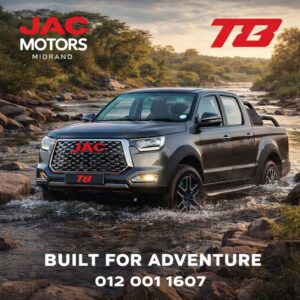 A JAC T8 bakkie driving through a rocky river, showcasing its water wading and off-road durability.